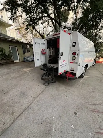 Magnet Plumbing service vehicle on-site for Water Heater Repair in Treichlers